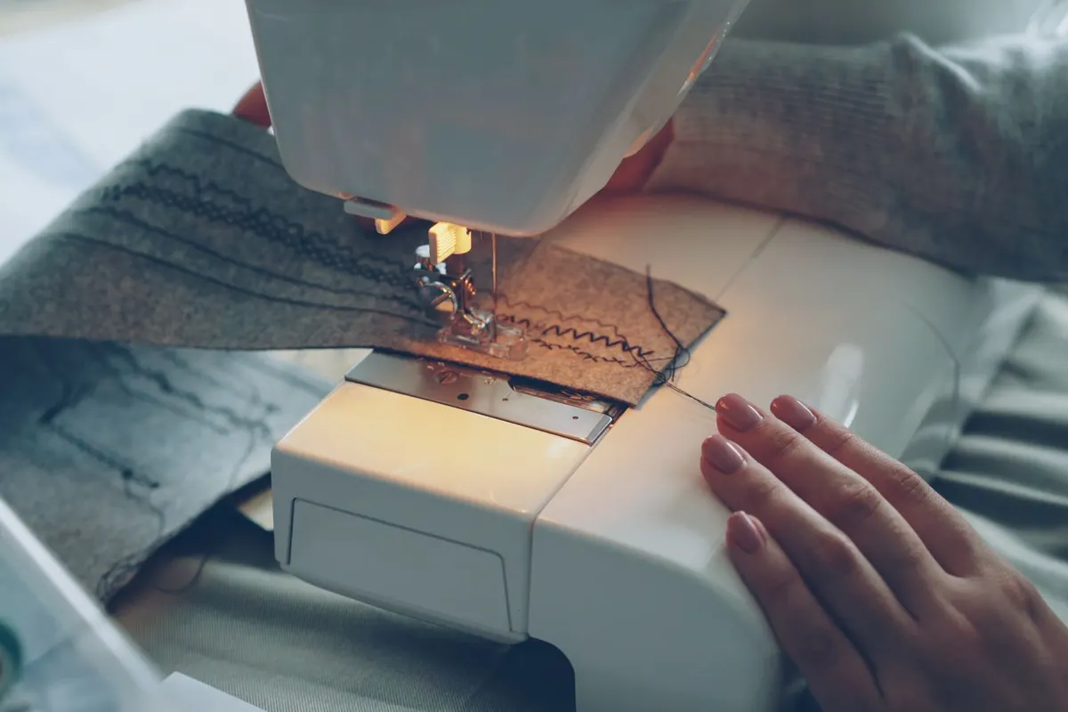 Sofa repair process for Super Market, Islamabad — measuring and stitching