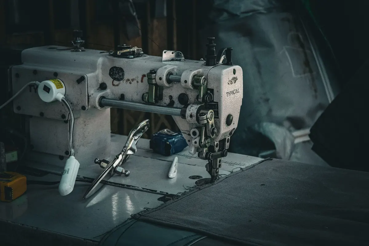 Sofa repair process for D-14, Islamabad — measuring and stitching